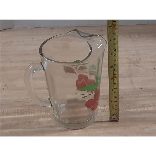 Vintage glass juice pitcher featuring a cherry pattern.