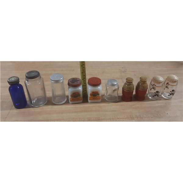 Lot of vintage salt and pepper shakers.