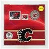 Image 1 : 2014 Colourized Calgary Flames 25 Cents. Includes 2 Stamps. Unopened.