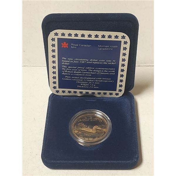 1987 Proof Loonie Dollar. The first year of the Loonie. Ultra Heavy Cameo. Housed in its original RC