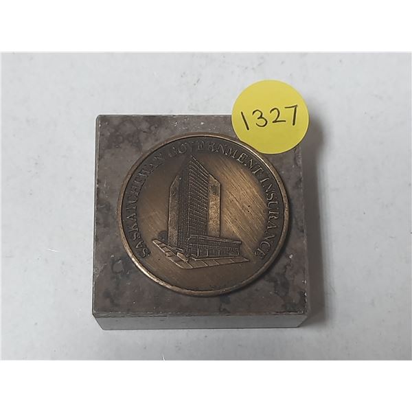 Saskatchewan Government Insurance medal commemorating the 1979 new building. Mounted on marble, the 