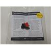 Image 2 : Boot of Remembrance pin. The boot represents Canadians who traded in their civilian shoes for combat