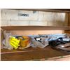 Image 2 : Contents of Shelf: Foam Weatherseal, Ear Plugs, Cords, Pipe Fittings, etc (shelf not included)