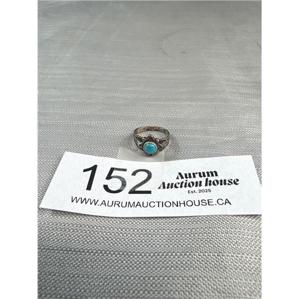 A Small Sterling + Turqouise Navajo Ring