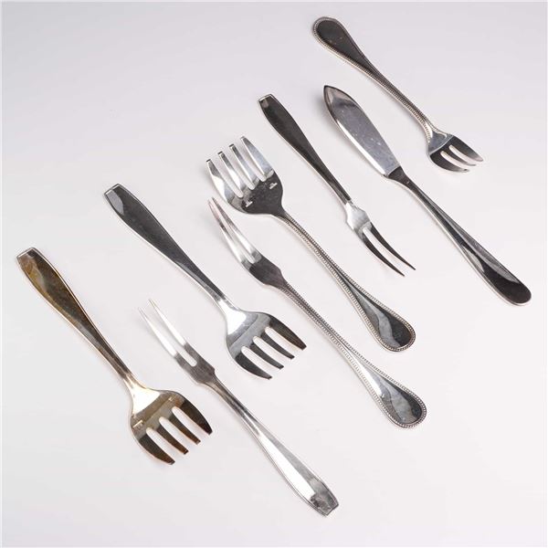 Eight Christofle Silverplated Specialty Flatware Pieces in America and Perles Patterns