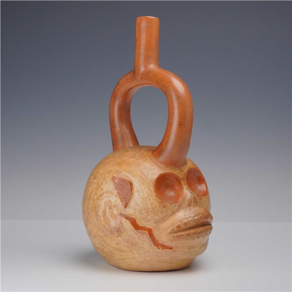 Moche Ceramic Stirrup Spout Vessel in the Form of a Skull