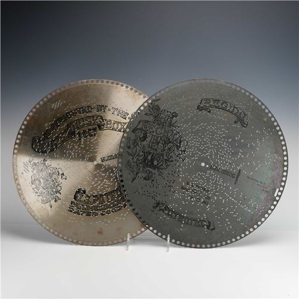 A Pair of Regina 15.5-Inch Music Box Discs, The Skaters Waltz and Papa's Lullaby, c. 1897