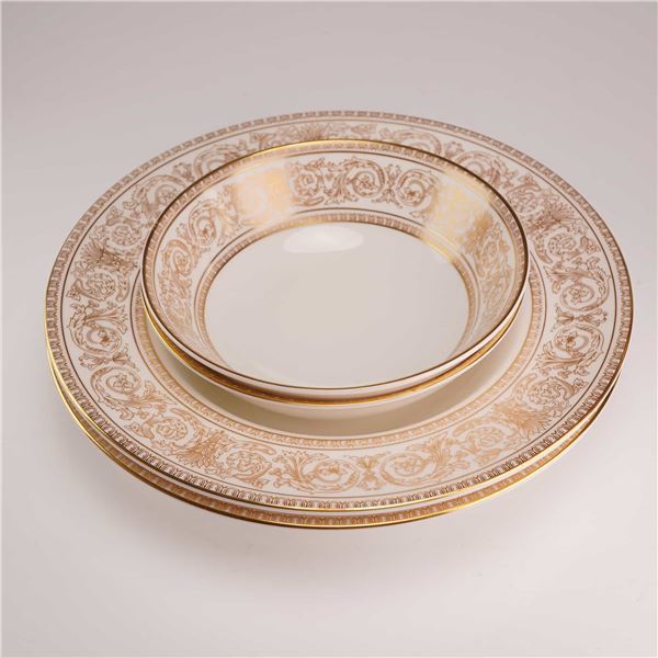 A 4-Piece Set of Royal Doulton English Fine Bone China in the Sovereign Pattern