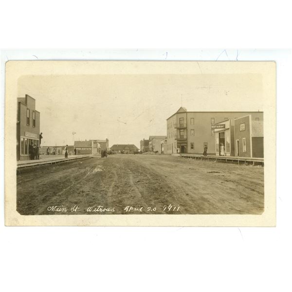 RPPC – “Main St. Watrous (SK).  April 20, 1911”.  Posted.