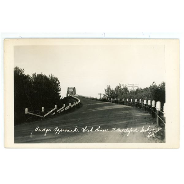 Vintage RPPC – “Bridge Approach.  Sask River, N. Battleford, Sask.”