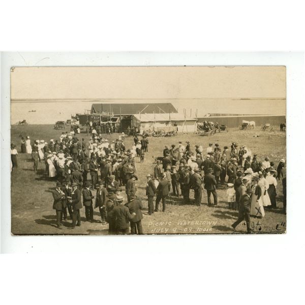 RPPC – “Picnic Watertown.  July 9 -09”.  Sask.  Postmarked “Crai