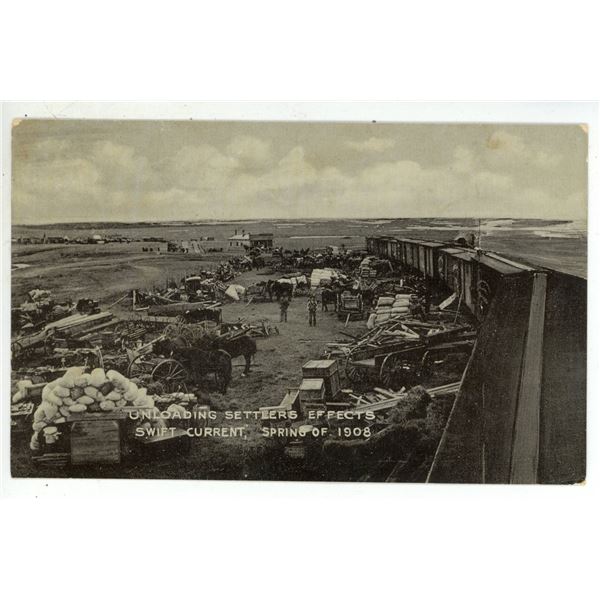 1908 Post Card – “Unloading Settlers Effects.  Swift Current, Spring of 1908[x=#82