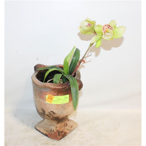REDDISH-BROWN CLAY VASE + GREEN ORCHID IN