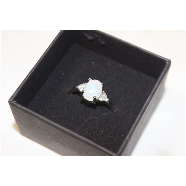 SZ. 9.5 OPAL LIKE CABOCHON WITH CZ ACCENTS RING