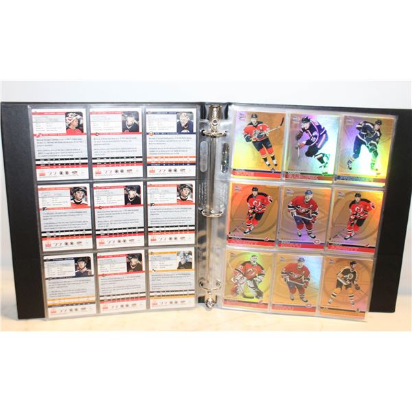 BINDER OF ALL PRISM GOLD HOCKEY APPROX 80 CARDS