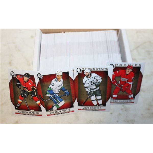 CORD STORAGE BOX WITH ASSORTED SPORTS