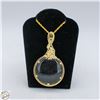 Image 1 : VINTAGE GOLD TONE MAGNIFYING GLASS PENDANT