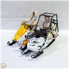 Image 1 : TWO 12 INCH ACTION FIGURES ON SKI-DOOS