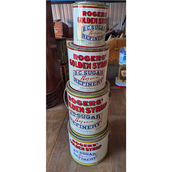Four Roger's Syrup Tins