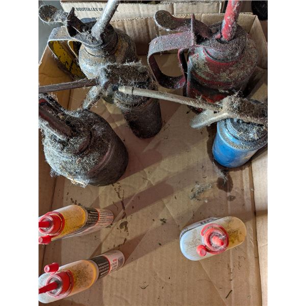 Five Oilcans and Three 3in1 Oil