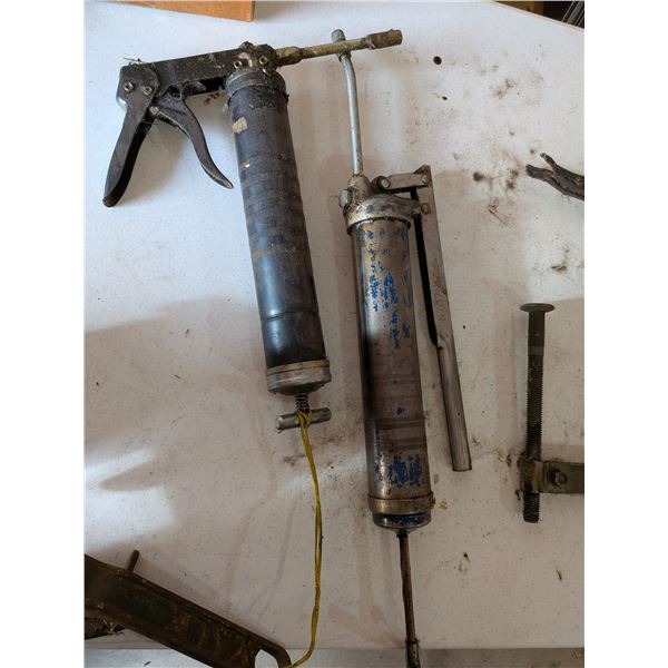 Two Grease Guns