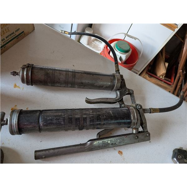 Two Grease Guns