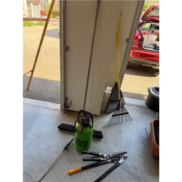 Garden rakes broom sprayer and clippers