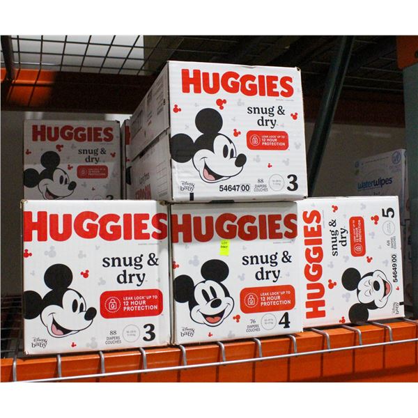 LARGE LOT OF HUGGIES SNUG AND DRY DIAPERS SIZE 3,4