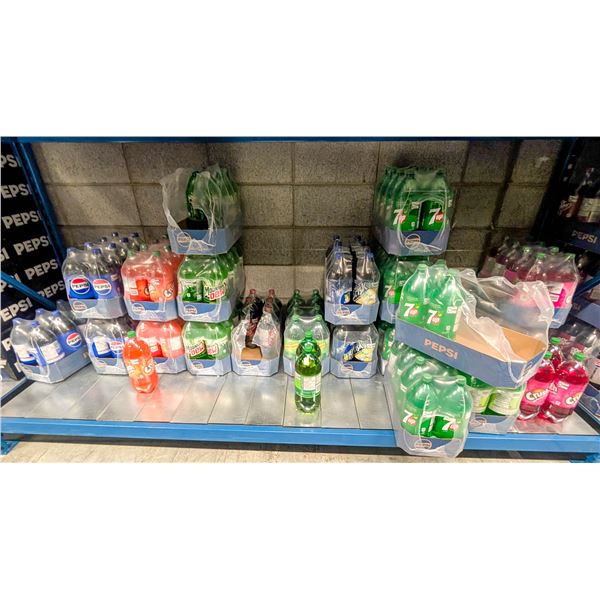 LARGE LOT OF ASSORTED 2L POP BOTTLES INCLUDES