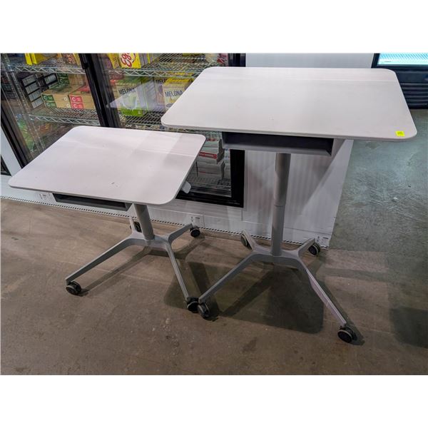 TWO HEIGHT ADJUSTABLE ROLLING WORK STATIONS