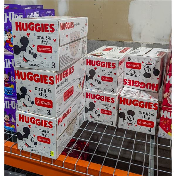 LARGE LOT OF HUGGIES SNUG AND DRY DIAPERS SIZES