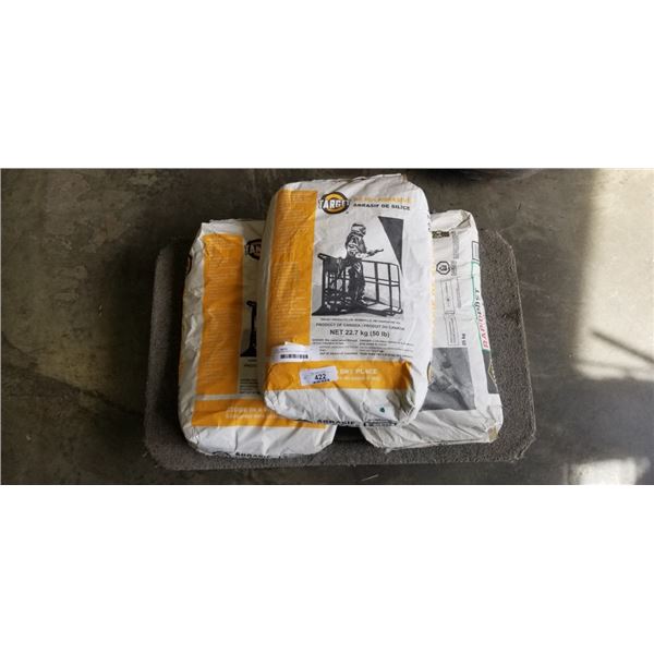 2 NEW 50LB BAGS OF TARGET SILICA  ABRASIVE AND 50LB SAKRETE RAPID POST CEMENT