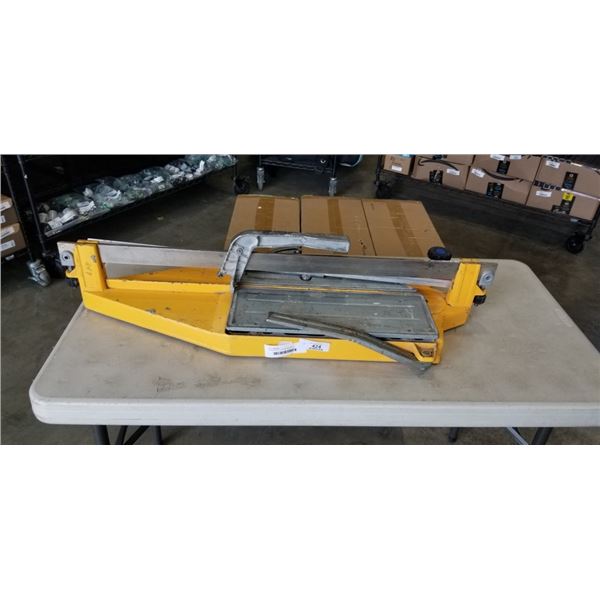 LARGE METAL TILE SAW, WORKING