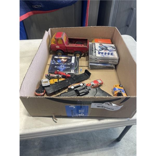 ASSORTED TOYS INCLUDING CARS, TRUCKS, CDS, AIR SOFT GUN FOR PARTS