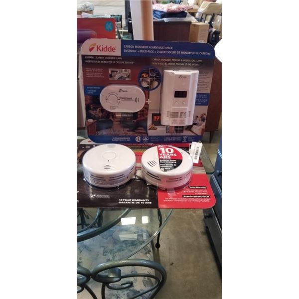 PAIR OF KIDDE SMOKE ALARMS AND KIDDE PORTABLE CARBON MONOXIDE ALARM