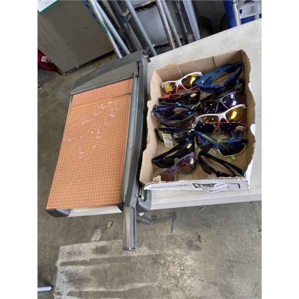 TRAY OF SUNGLASSES AND PAPER CUTTER