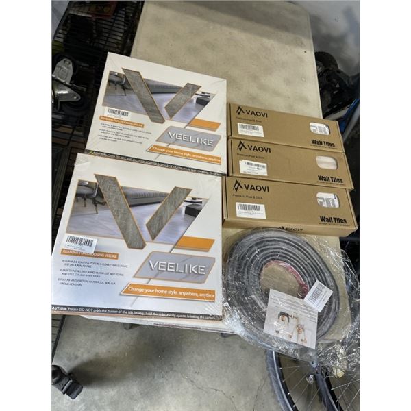 2 BOXES OF NEW PEEL AND STICK FLOOR TILES AND 3 BOXES OF PEEL AND STICK BACKSPLASH AND MOULDING
