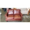 Image 1 : BROWN LEATHER LOVESEAT WITH BRASS NAILHEAD ACCENTS