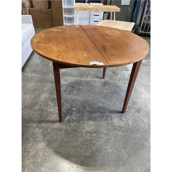 ROUND TEAK DINING TABLE