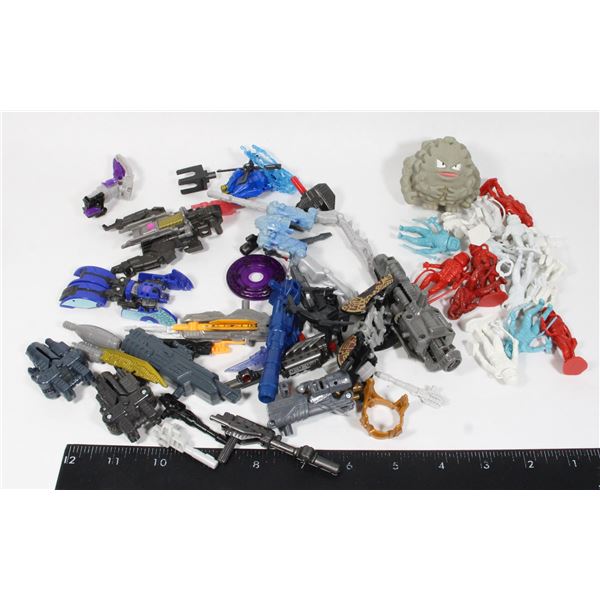 LOT OF TRANSFORMER PARTS/WEAPONS FOR COMPLETION/