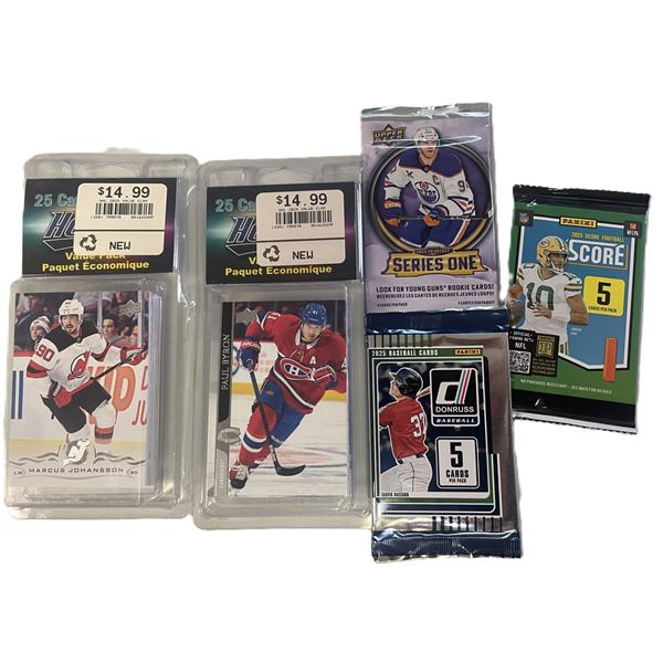 Hockey trading cards and sealed sports card packs