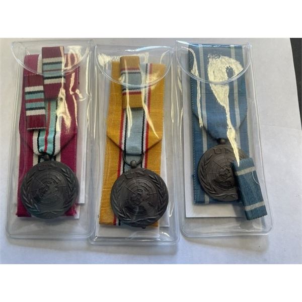 THREE original United Nations service medals for different international peacekeeping missions
