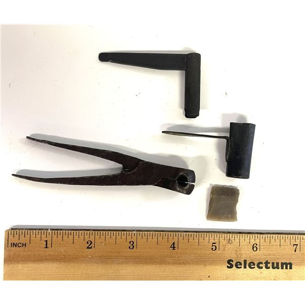 Civil War bullet mold set contains a round ball mold and a combination tool used for maintenance.