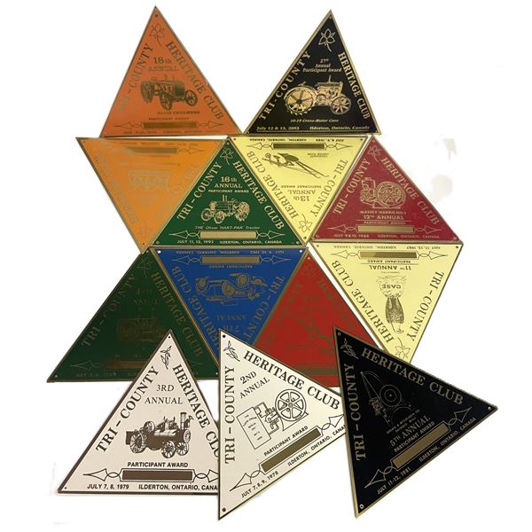 Metal triangular badges from the Tri-County Heritage Club in Ontario, Canada
