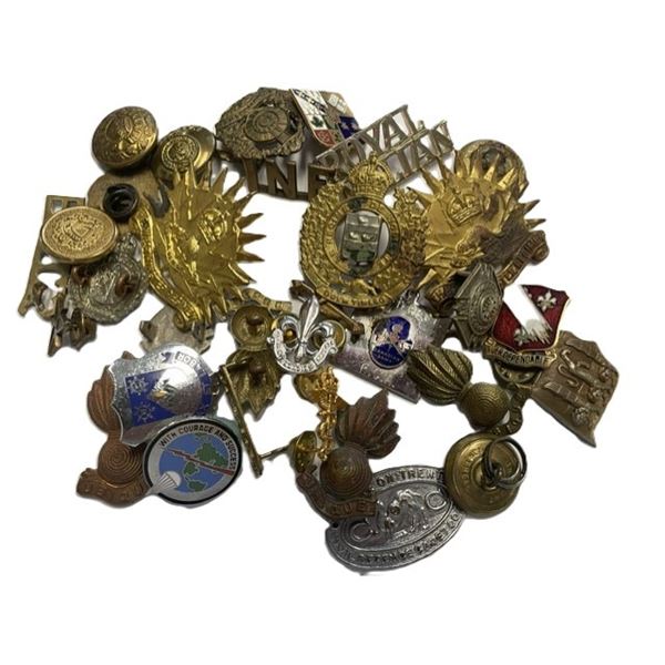 Canadian militaria, including various cap badges and sweetheart pins.