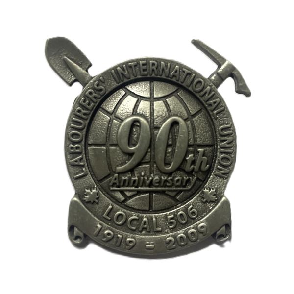 pin celebrating the 90th anniversary of Laborers
