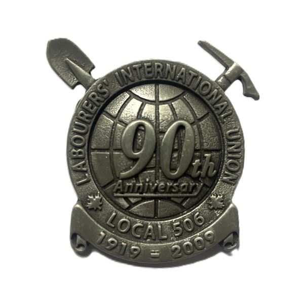 pin celebrating the 90th anniversary of Laborers