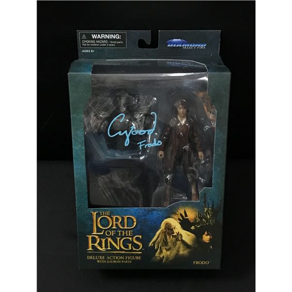 ELIJAH WOOD SIGNED LORD OF THE RINGS ACTION FIGURE (WWOC COA)