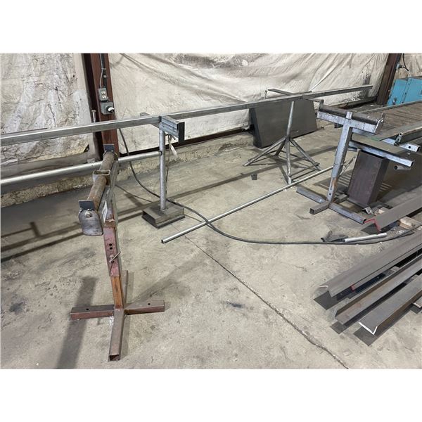GROUP OF 4 MATERIAL ROLLER/STANDS