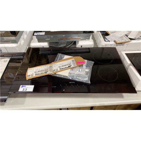 SMEG MODEL SEU365ETB. 36" BUILT IN CERAMIC ELECTRIC COOKTOP WITH 5 HEAT ZONES, TOUCH CONTROLS,